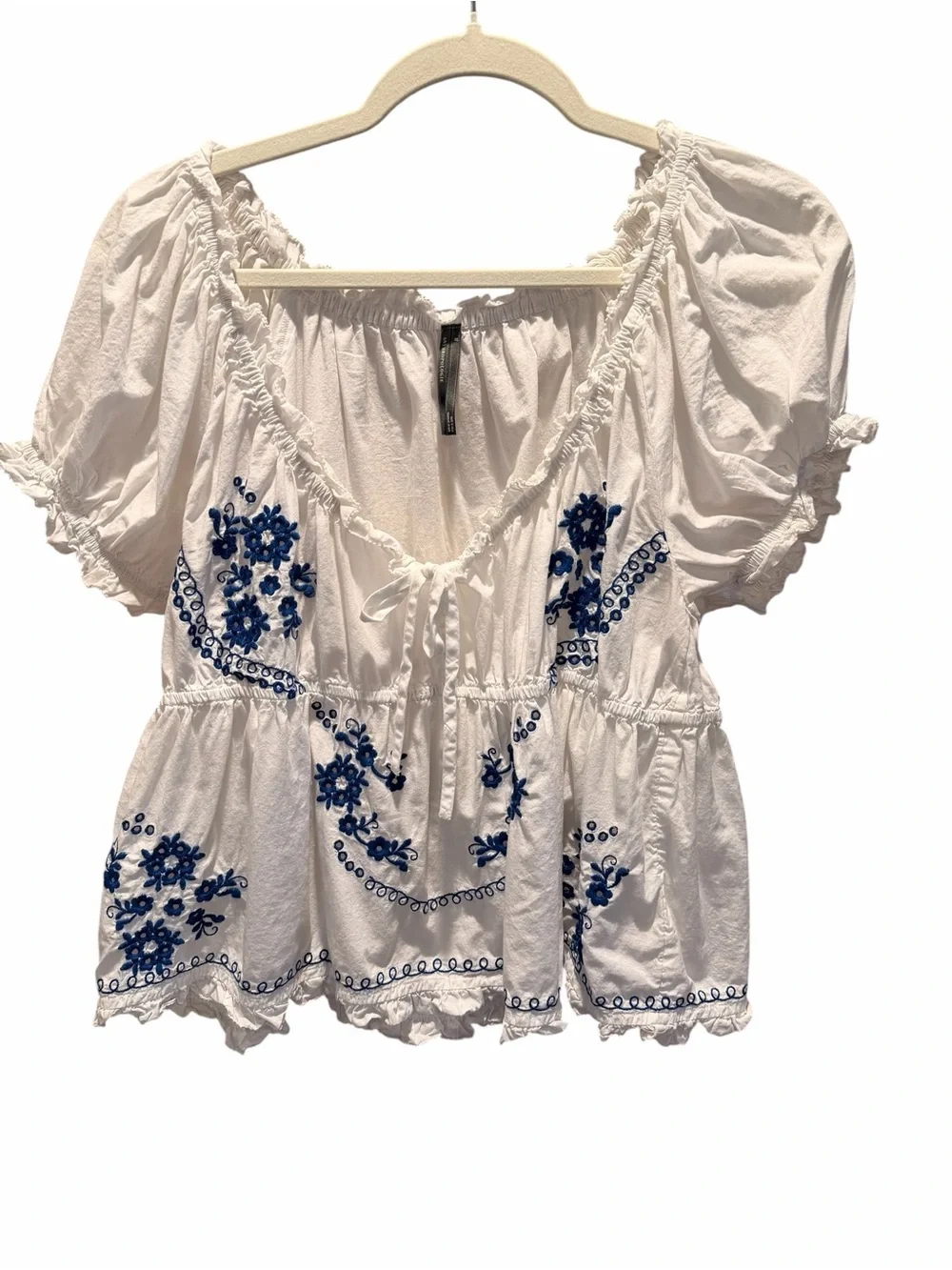 Anthropologie White Babydoll Top with Blue Embroidered Floral Detail Medium